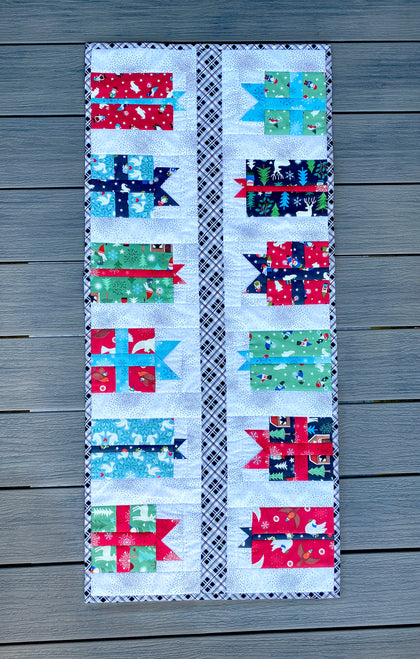 In the Present Table Runner, a finished Quilt As You Go project